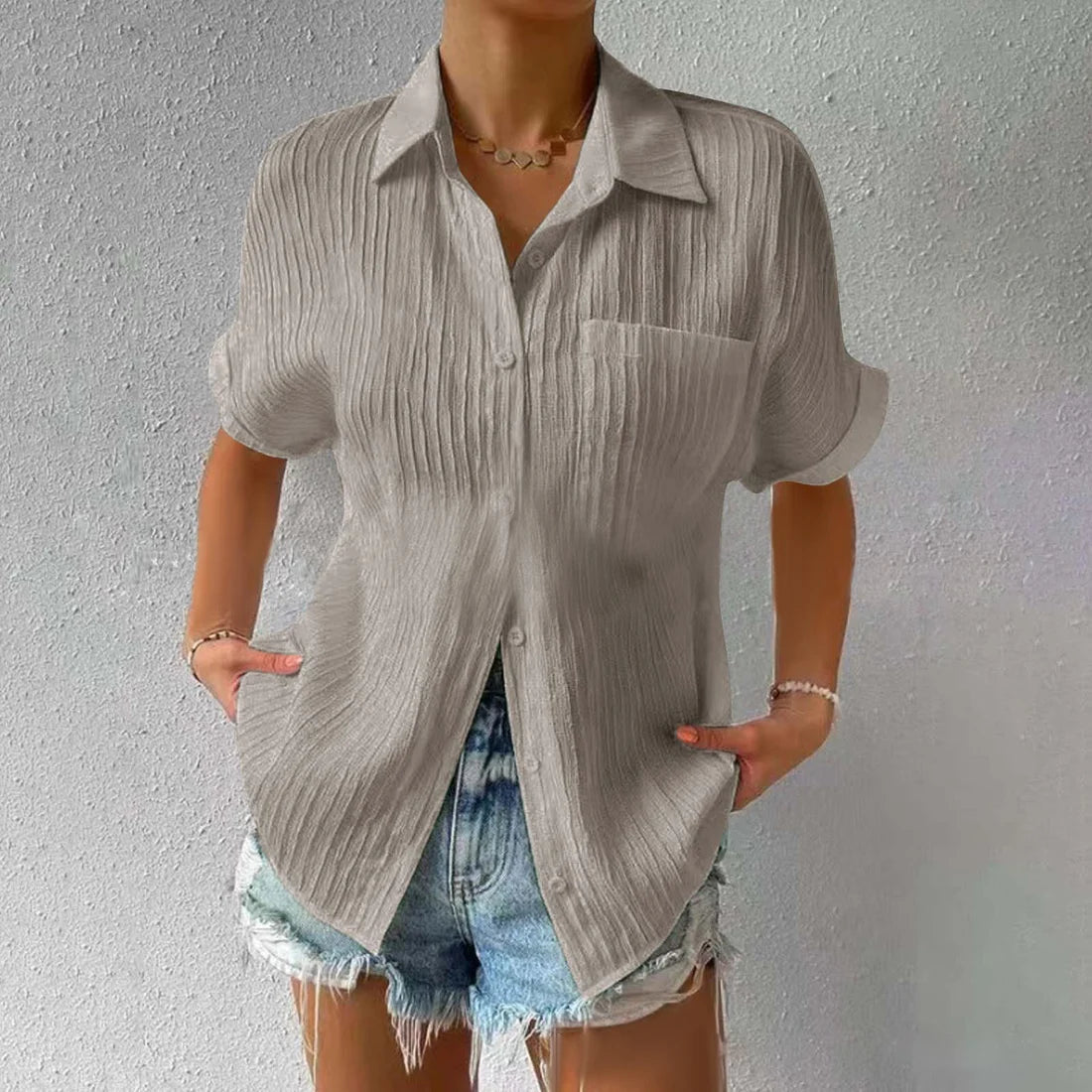 Avslappet løs bluse med knapper