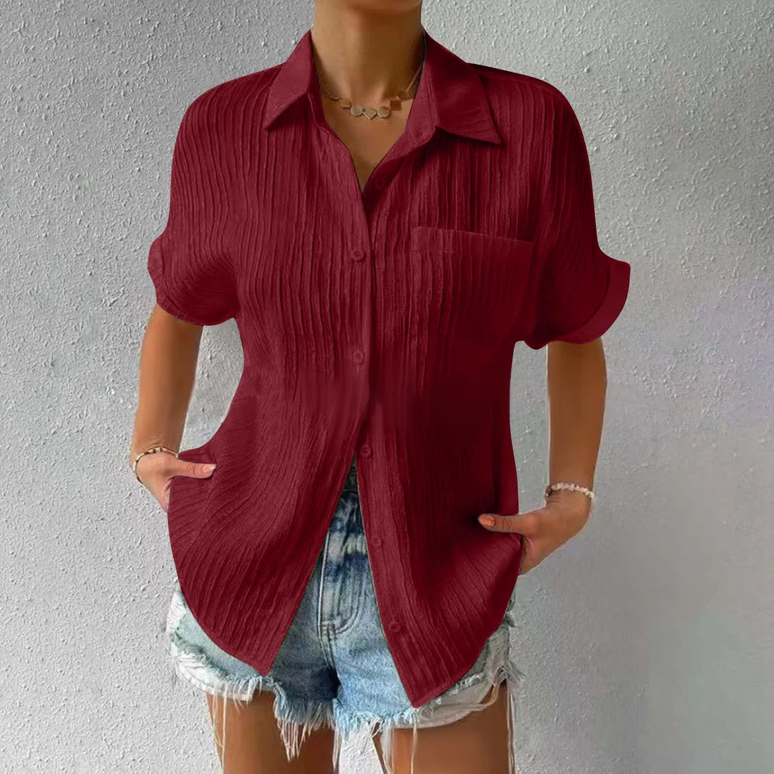 Avslappet løs bluse med knapper