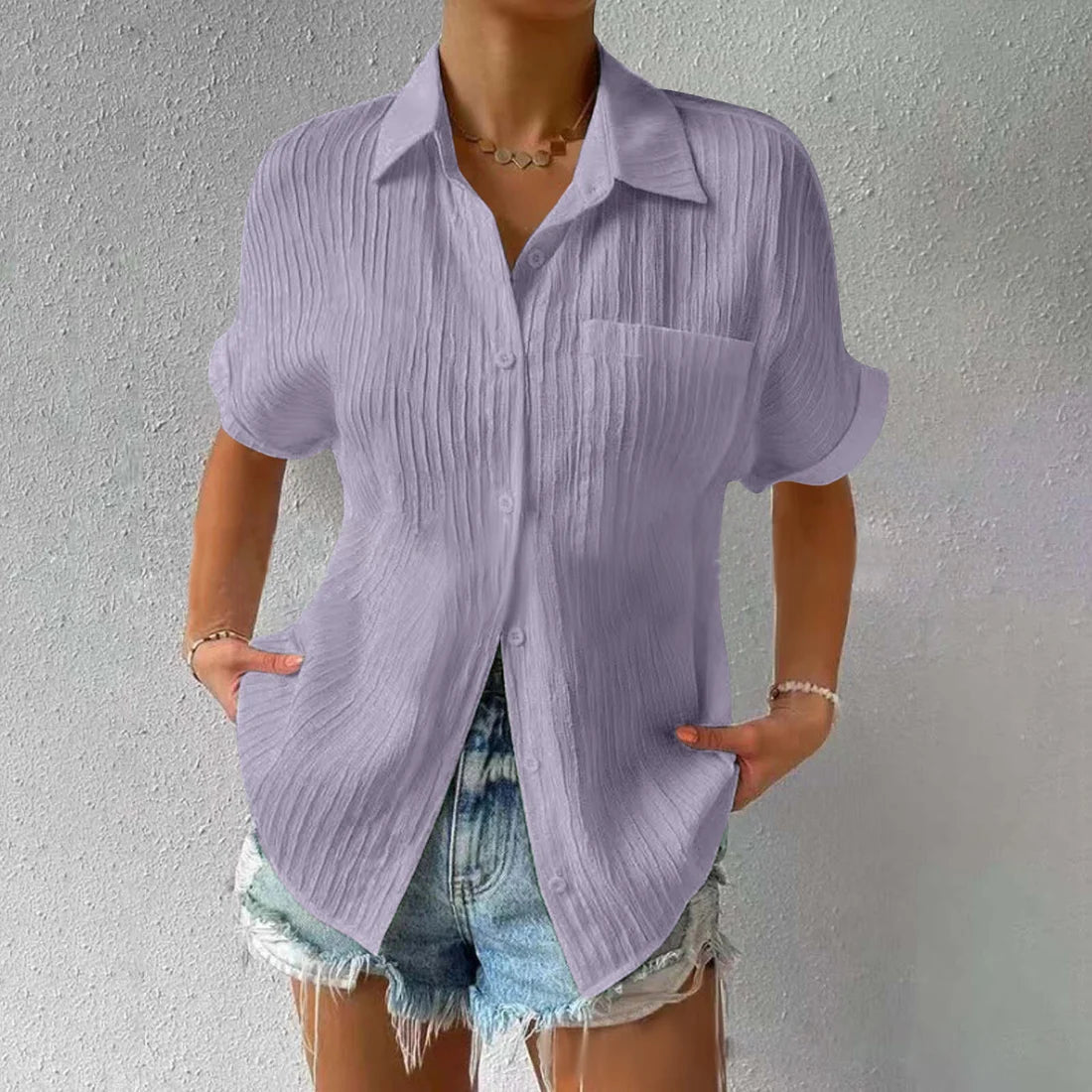 Avslappet løs bluse med knapper