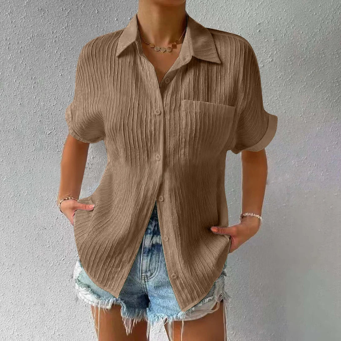 Avslappet løs bluse med knapper