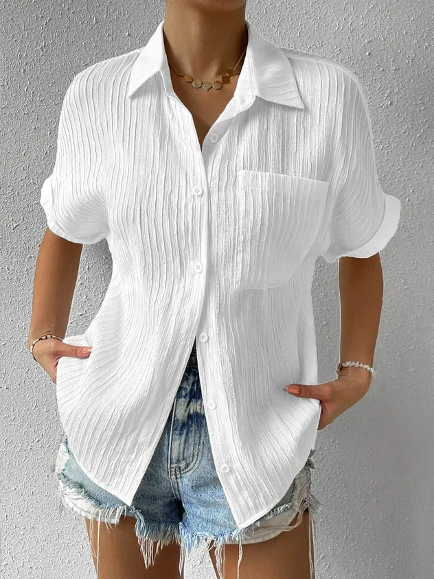 Avslappet løs bluse med knapper