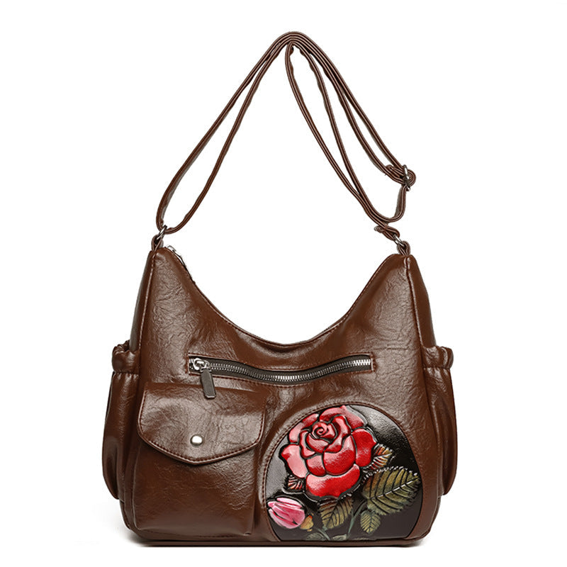 Dameskinnveske med Vintage Rose Design