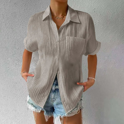 Avslappet løs bluse med knapper